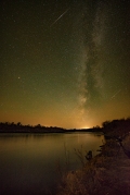 Meteorite passes by in front of Milky Way on the Snake River. Looking towards American Falls, Idaho.
