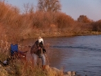 Karrie aligning her shot along the Snake River.
